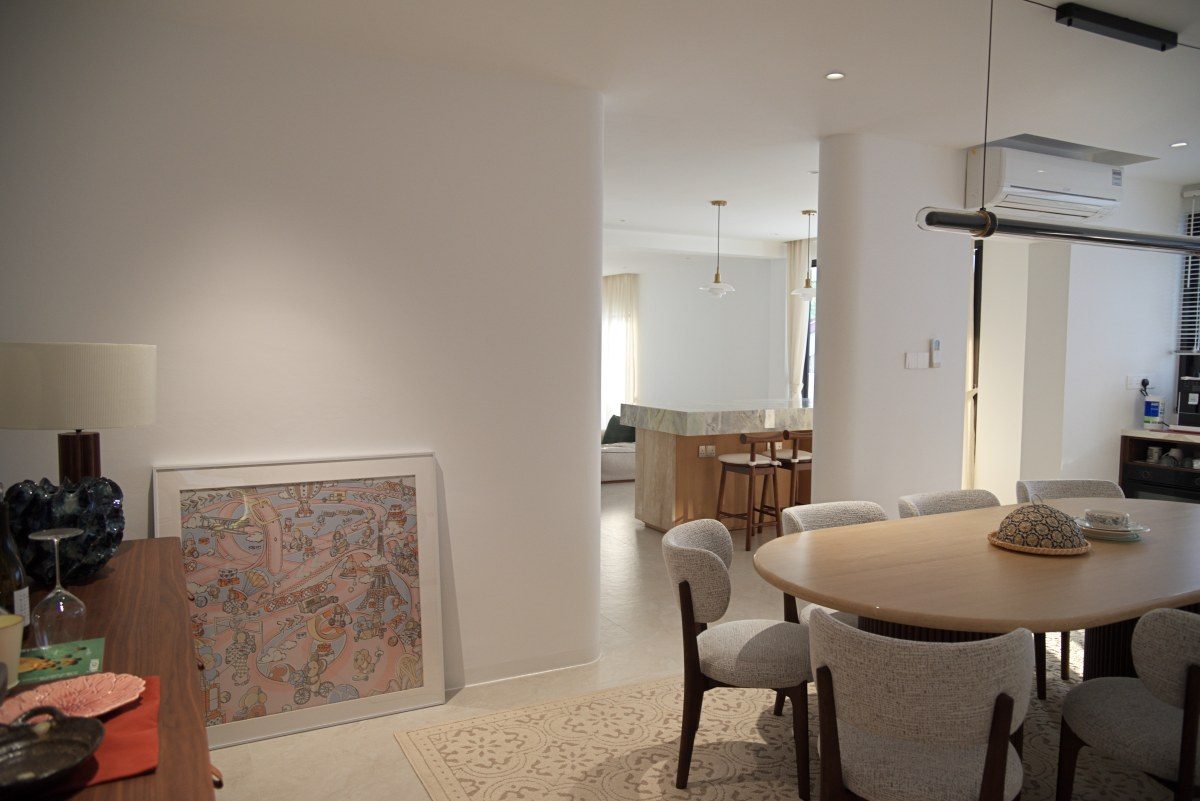 The finished dining end, opening through to the kitchen island